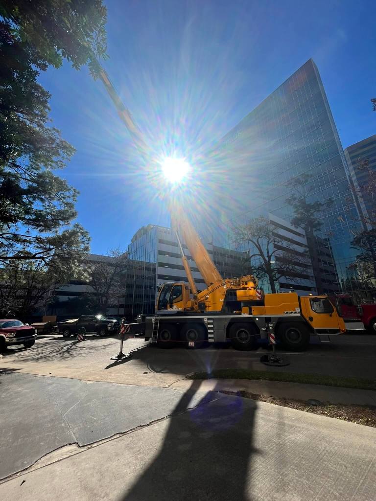 Mobile crane lifting structural elements for an office building in Dallas, TX by Sean Gets Cranes
