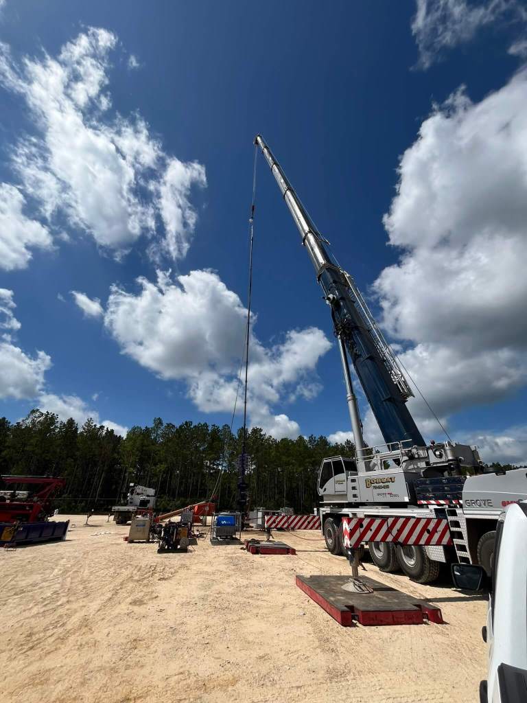 Mobile crane performing a nighttime lift for a commercial project in Houston, TX by Sean Gets Cranes