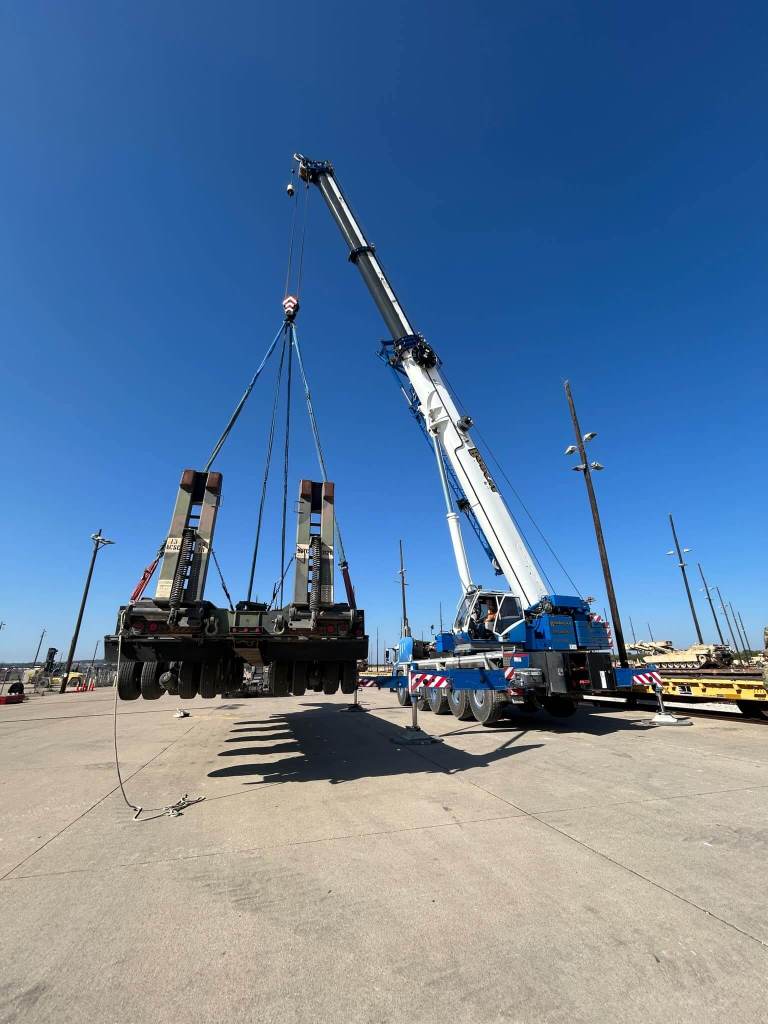 Mobile crane placing rooftop HVAC unit in San Antonio, TX by Sean Gets Cranes